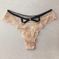 Beige lace thong with black trim, polka dot mesh and heart metal details for women - Nude