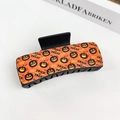 Gothic Halloween hair claw clip featuring orange pumpkin pattern and Trick or Treat text - Halloween #10 - Rectangle