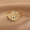 Adjustable gold evil eye ring with blue and white zircon on premium brown silk background - Evil Eye Heart Style (Q-J071) / Gold