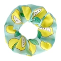 Detailed view of light blue satin scrunchie featuring fresh yellow lemon patterns - Lemon Green