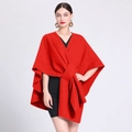 Chic red knitted poncho cape with front knot detail for women in elegant winter style - One Size / Red