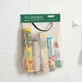 Beige mesh storage hanging bag with green trim for kitchen and bathroom wall organizing - Single Piece / Green