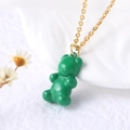 Gold-plated necklace featuring a translucent emerald green resin gummy bear pendant - Green