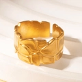 Golden adjustable titanium steel ring featuring an irregular organic textured surface - Gold 35