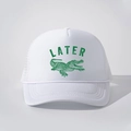 White foam mesh trucker hat featuring a green alligator graphic and LATER print - One Size / All White