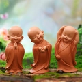 Three cute brown little monk figurines with different poses for car dashboard decor - Little Monk Collection (1034-6)