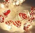 Christmas LED fairy lights featuring red and white Santa hat decorations with warm glow - 1m 10-LED (2AA Battery Model) / Christmas Hat