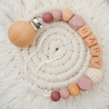 Detail of pink silicone beads, crochet ball and BABY letter beads on beechwood pacifier clip - Dusty Pink