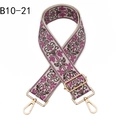 Close-up of colorful ethnic jacquard purse strap with floral embroidery and gold hardware - B10-21/Gold
