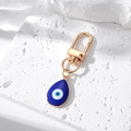 Boze oog hanger sleutelhanger in goudkleurige legering en diepblauw emaille - Goud Waterdruppel Donkerblauw Boze Oog