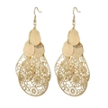 Bohemian gold layered hollow disc earrings in polished alloy finish for women - Hollow Out Dangle Earrings / Gold