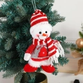 Christmas snowman plush ornament with grey sequins and red striped knit hat on tree - Snowman