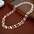 Double-layered pearl necklace with golden rose charms and sparkling crystal accents - 55# Necklace-White-Hollow Rose
