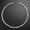 Détail du collier tennis en zircon multicolore avec base argentée sur fond sombre - 425mm*8mm / Base Argentée Collier en Zircone Multicolore