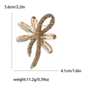 Golden flower bow brooch with amber crystals and rhinestones, size 5.6cm x 4.1cm - Gold-3992