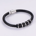 Bracciale in pelle nera intrecciata con chiusura magnetica in acciaio e anelli argento - Colore Acciaio