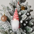Detail of a red and white striped knit Christmas gnome ornament hanging on a snowy tree - C3-1 Red Small Hanging Ornament Style C (Red White Striped Knitted Hat)
