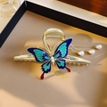 Elegant gold metal hair claw with blue enamel butterfly and pearl tassel fringe detail - Gold Butterfly Pearl Tassel Large Claw