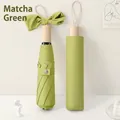 Portable Matcha Green folding umbrella with a bow handle and a matching hard storage case - Matcha Green