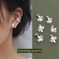 Silver four-leaf clover stud earrings with a secure screw back design for women - Clover Spiral Lock (A66)