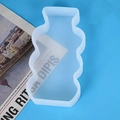 Close-up of wavy translucent silicone mold for geometric candles and home decor - Large Vase Shape Candle Mold