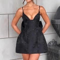 Elegant black mini party dress featuring deep V-neck and large back bow detail - S / Black