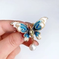 Elegant butterfly brooch with blue enamel wings, gold crystal trim and pearl drop - Blue Gradient Butterfly