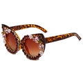 Cat eye sunglasses with tortoise frame and rhinestone floral decor from a 45-degree angle - Leopard Frame / Tea Rhinestone