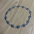 Vintage silver metal chain belt with oval turquoise blue stone inlay on wood background - 56-58cm / Vintage Turquoise Silver Chain Belt (AB310)