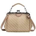 Close-up of vintage beige woven handbag with embossed metal floral clasp and leather handle - Khaki