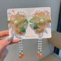 Handmade Chinese floral hair clips with orange resin petals and long pearl tassels - Yunmengze Orange Green