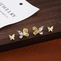 Elegant gold butterfly earrings set with sparkling crystals and minimalist metal studs - Gold Butterfly Rhinestone