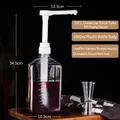 1600ml clear syrup bottle with white 20cc pump head and visible scale markings - 20cc Long Pump + 1600ml Plastic Bottle