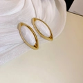 Close-up of vintage gold earrings with white oval pearl inlay on white fabric - White Water Drop Studs (Silver Needle)