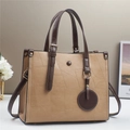 Large vintage leather tote bag in brown and coffee two-tone design with gold hardware - Khaki