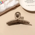 Close-up of minimalist coffee-colored hair claw clip on silk with elegant props - Milk Coffee Matte-Cross