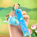 Blue silicone ice cream cup keychain with brown bear and rainbow wish wrist strap - Rainbow Ice Cream / Blue