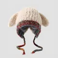 Detalle del gorro infantil con orejeras, orejas largas y ribete de punto colorido - 3-8 Años / Beige