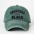 Close-up of ORIGINAL black embroidery on vintage green washed cotton baseball cap - One Size / Dark Green