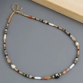 French vintage tiger eye beaded necklace with a golden butterfly charm and round beads - Butterfly Ornament Black Beaded Style (XL-801J)