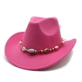Close-up of ethnic decorative band with shells and beads on pink felt cowboy hat - Rose Red