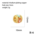 Tableau de taille détaillé du pendentif œil maléfique doré avec dimensions 12mm x 10mm - Oeil Tricolore avec Zirconia