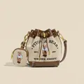Beige canvas bucket bag with brown leather trim and cute bear embroidery detail - Canvas Beige