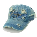 Detailed close-up of distressed denim baseball cap featuring metal rings and Raisa embroidery - M(56-58cm) / Yellow