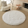 Minimalist round white plush rug displayed on light wood floor in a modern living room - Pure White