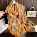 Detail of elegant orange wavy silk scarf with fine texture and premium edge stitching - Orange Waves / 180CM-130CM