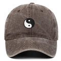 Close-up of brown cotton baseball cap featuring Tai Chi Yin Yang embroidery detail - One Size / Coffee