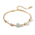 Gold stainless steel snake chain bracelet with zircon beads and blue evil eye pendant - Gold Square Evil Eye Style