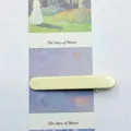 Cream yellow minimalist flat duckbill hair clip on a Monet art display card - White