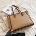 Elegante borsa tote in ecopelle kaki con manici marroni e design capiente e sobrio - Cachi